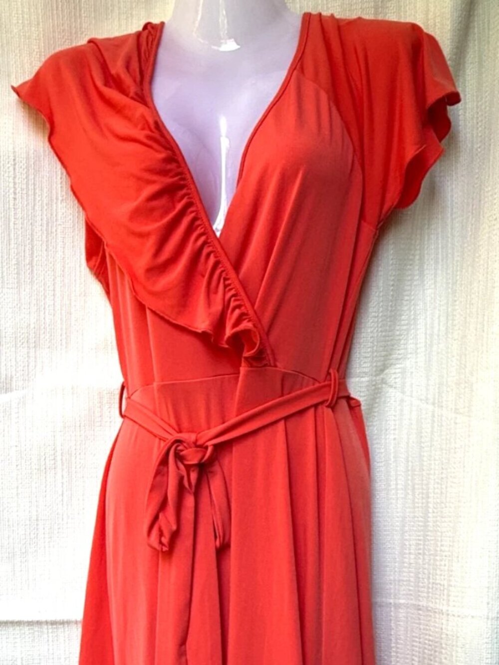 A charming red synthetic fabric dress